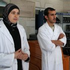 Two Arabic doctors in white coats